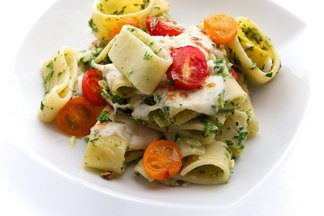 Baked Calamarata Pasta with Arugula Pesto, Almonds, Fresh Mozzarella & Cherry Tomatoes 
