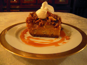 Pumpkin Pudding with Caramel, Apples, and Pecans, topped with Frangelico Cream