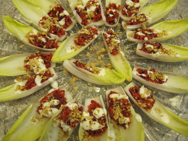Cranberry and Persimmon Filled Endive with Tangy Goat Cheese Dressing