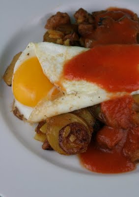 Yukon Gold and Chicken Apple Sausage Hash with Fried Eggs and Spicy Tomato Coulis