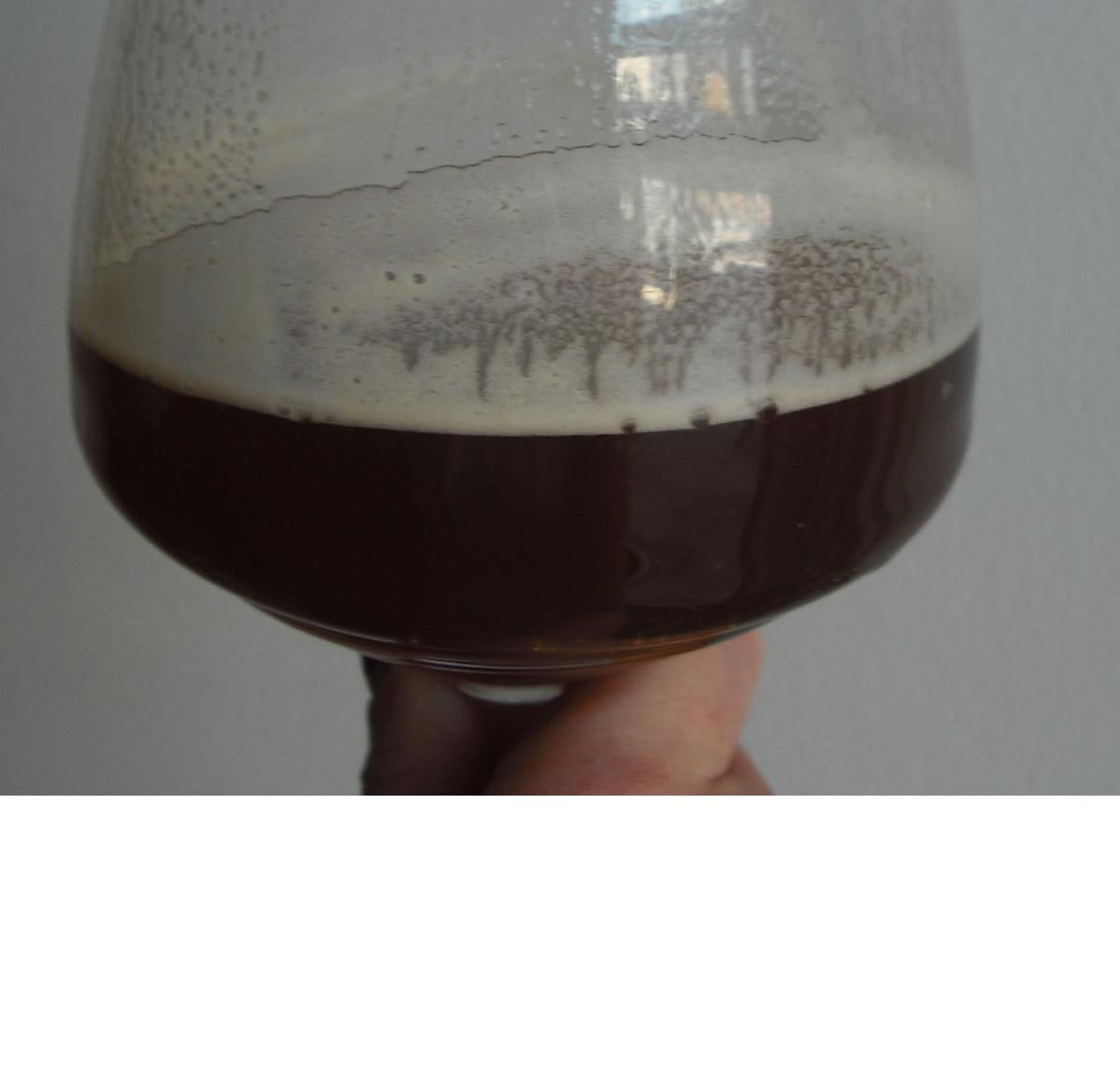 Beer Cocktail with Pomegranate Molasses and Elderflower Liqueur