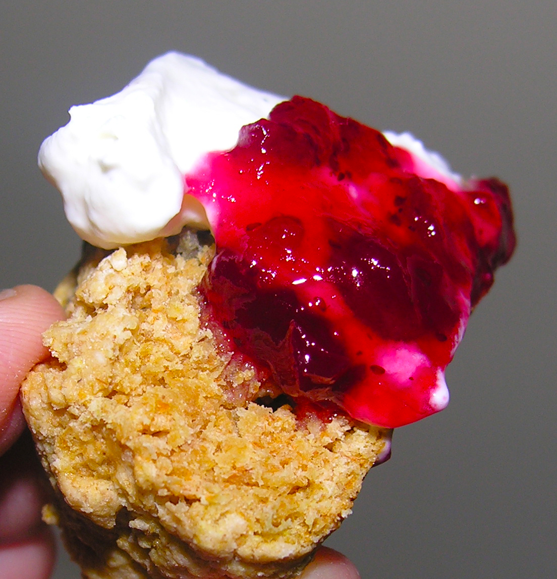 Whole grain scones with green cardamom and lingonberry