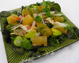 Ceviche with pink grapefruit and green olives