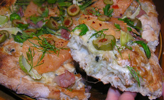 Pink grapefruit and green olive pizza