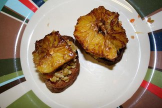 Crostini Topped with Balsamic-Simmered Oranges and Crushed Olives