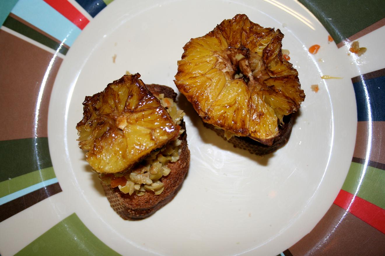 Crostini Topped with Balsamic-Simmered Oranges and Crushed Olives