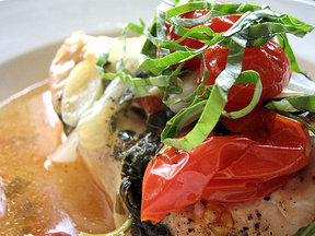 Chicken en papillote with basil and cherry tomatoes 