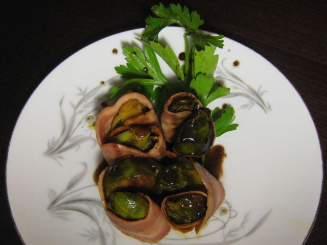 Turkey Bacon Wrapped Seared Brussels Sprouts with a Red Wine Reduction
