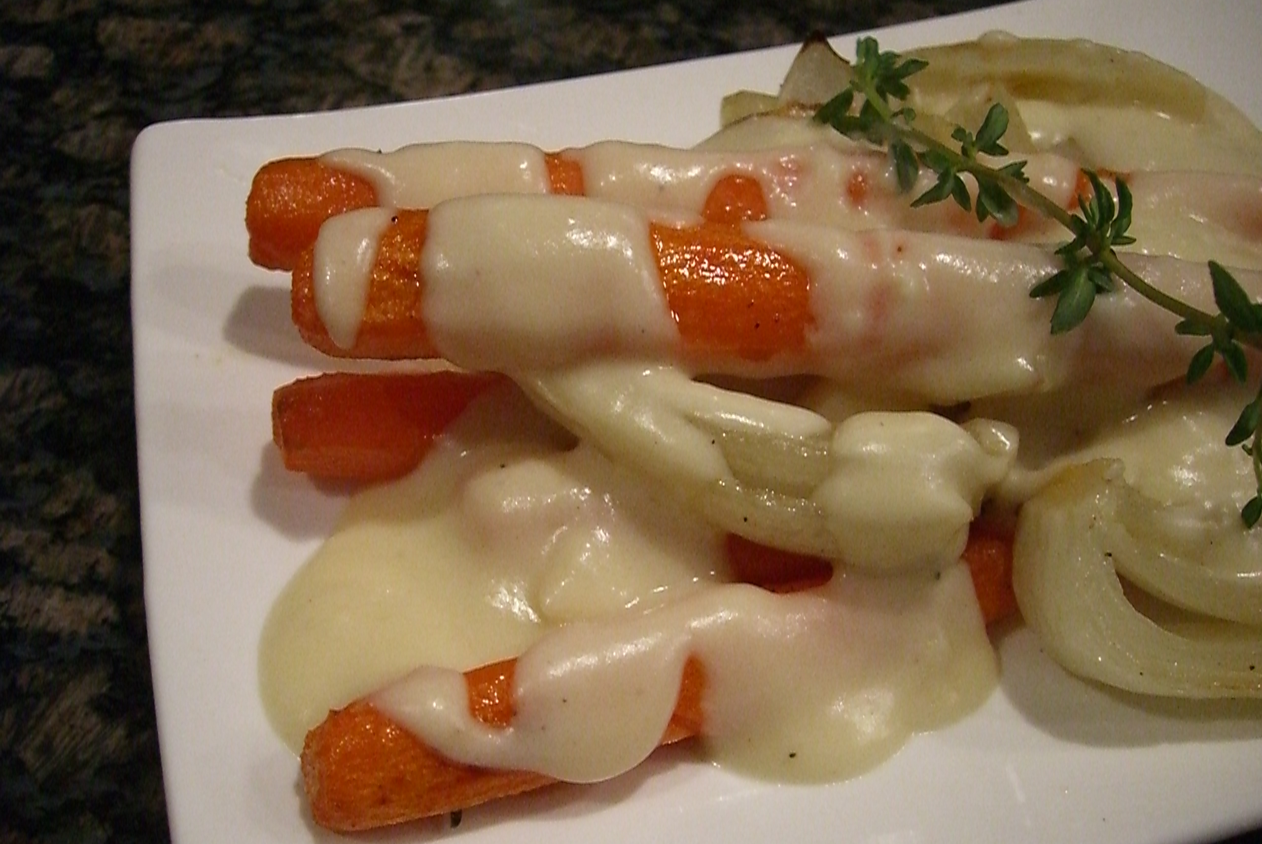 Roasted Carrots Cloaked in Fontina Sauce  