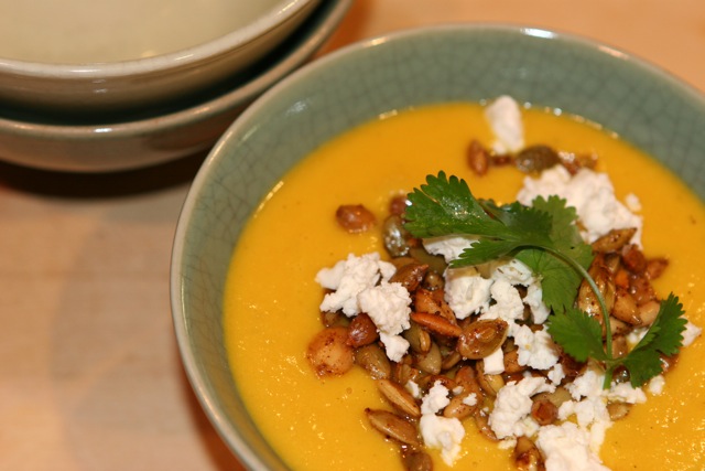 Cream of Carrot Soup with Fire-Roasted Chiles, Toasted Pepitos and Crumbled Feta