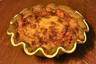 The Deli Tart:  Dark Rye Crust filled with Ham, Gruyere Cheese and Carmelized Onion