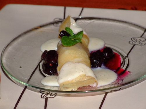 Motta  Khozhalappam( a crepe Stuffed with freshly grated coconut, golden raisons 