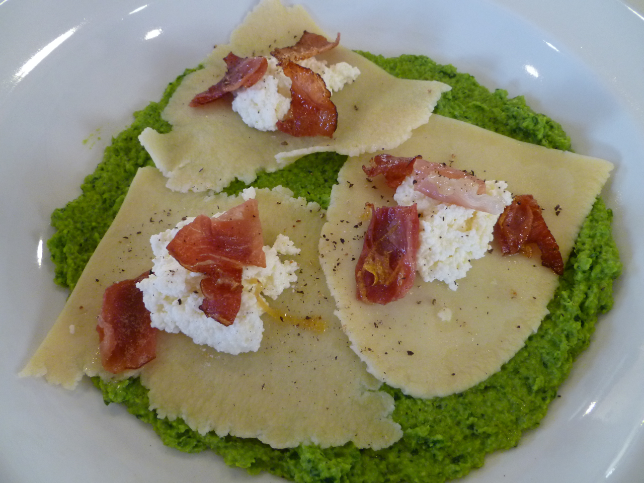 Ricotta floats in a sea of peas