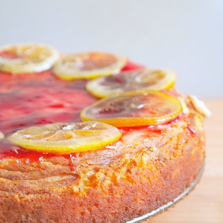 Grandma's Ricotta Cheesecake, Topped with Raspberry Glaze and Candied Lemon