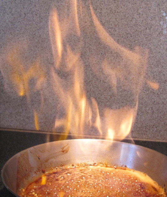 Pork Chops with Flaming Apricot Bourbon Sauce