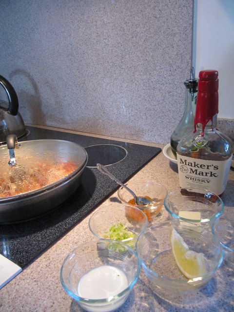 Pork Chops with Flaming Apricot Bourbon Sauce