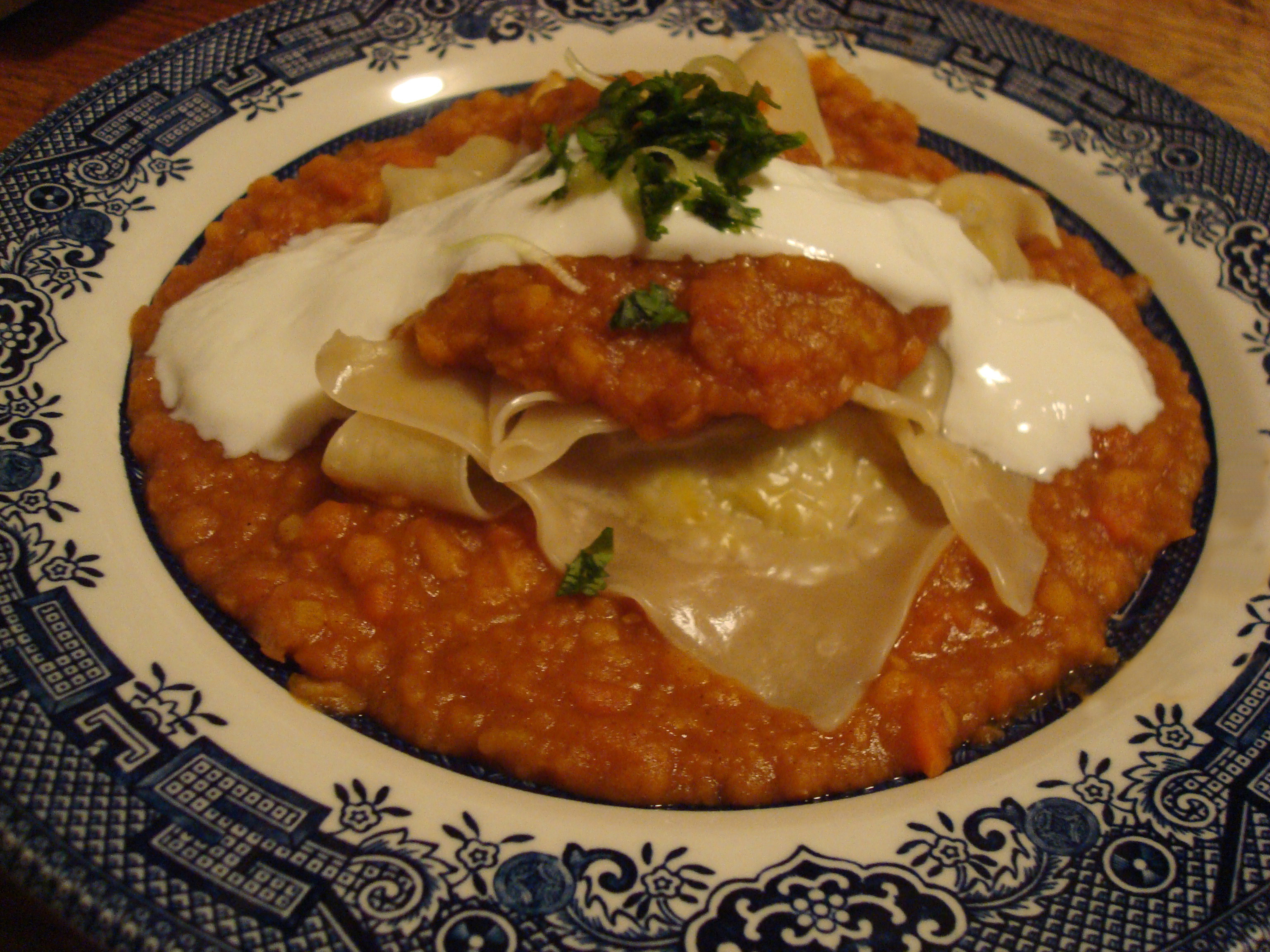 Leek Dumplings with Split Yellow Peas and Carrot Sauce