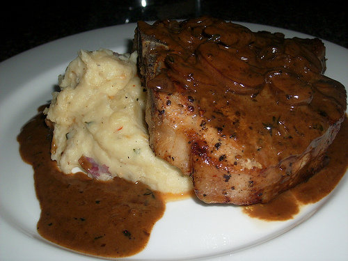 Grilled Pork Chop with Brandy Mushroom Sauce