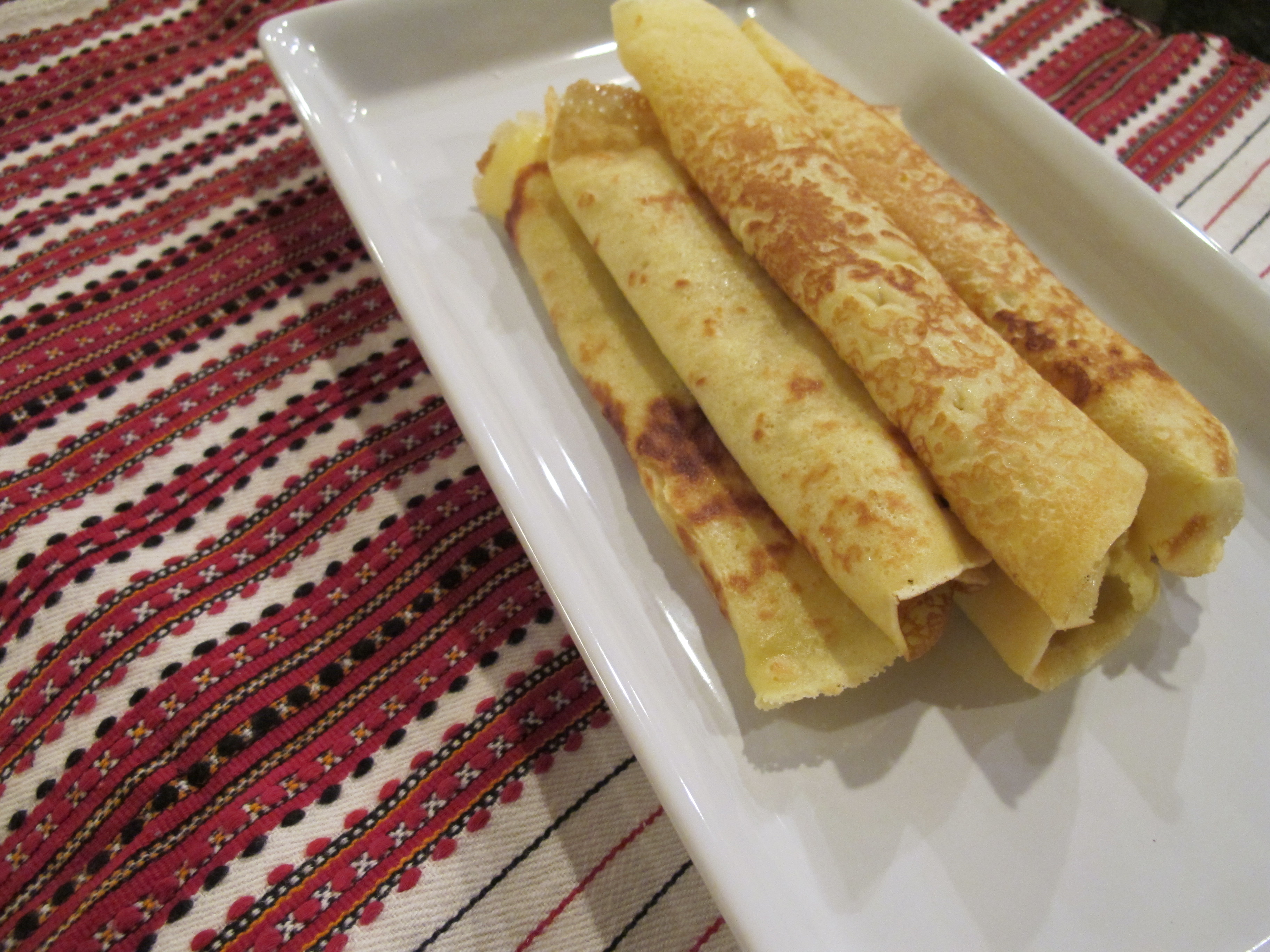 spinach-feta crepes with tomato coulis