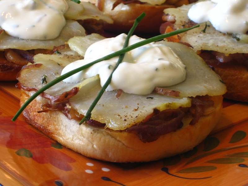 Bagel 'Pizzas' with Caramelized onions, Roasted Potatoes & Herbs topped with a faux Goat Cheese Creme Fraîche