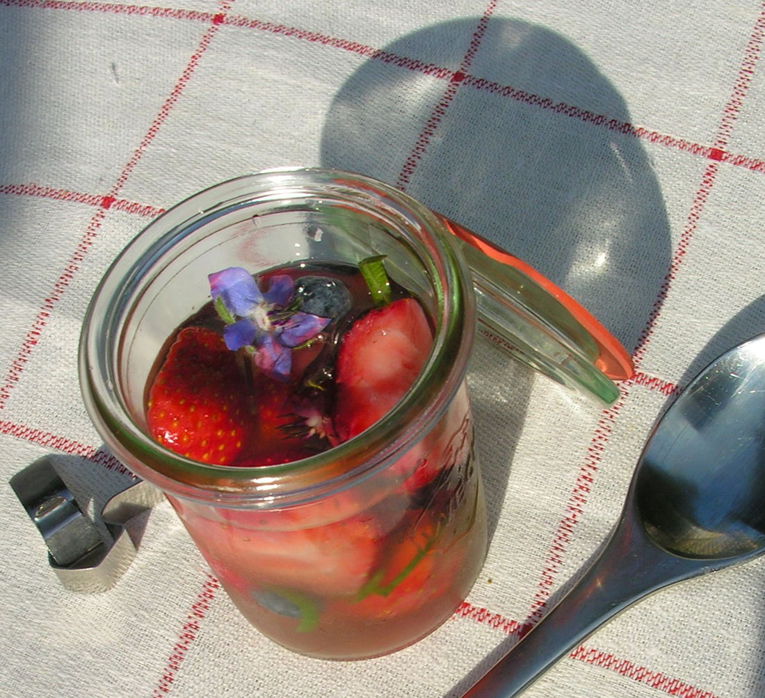 Herbed berries in wine