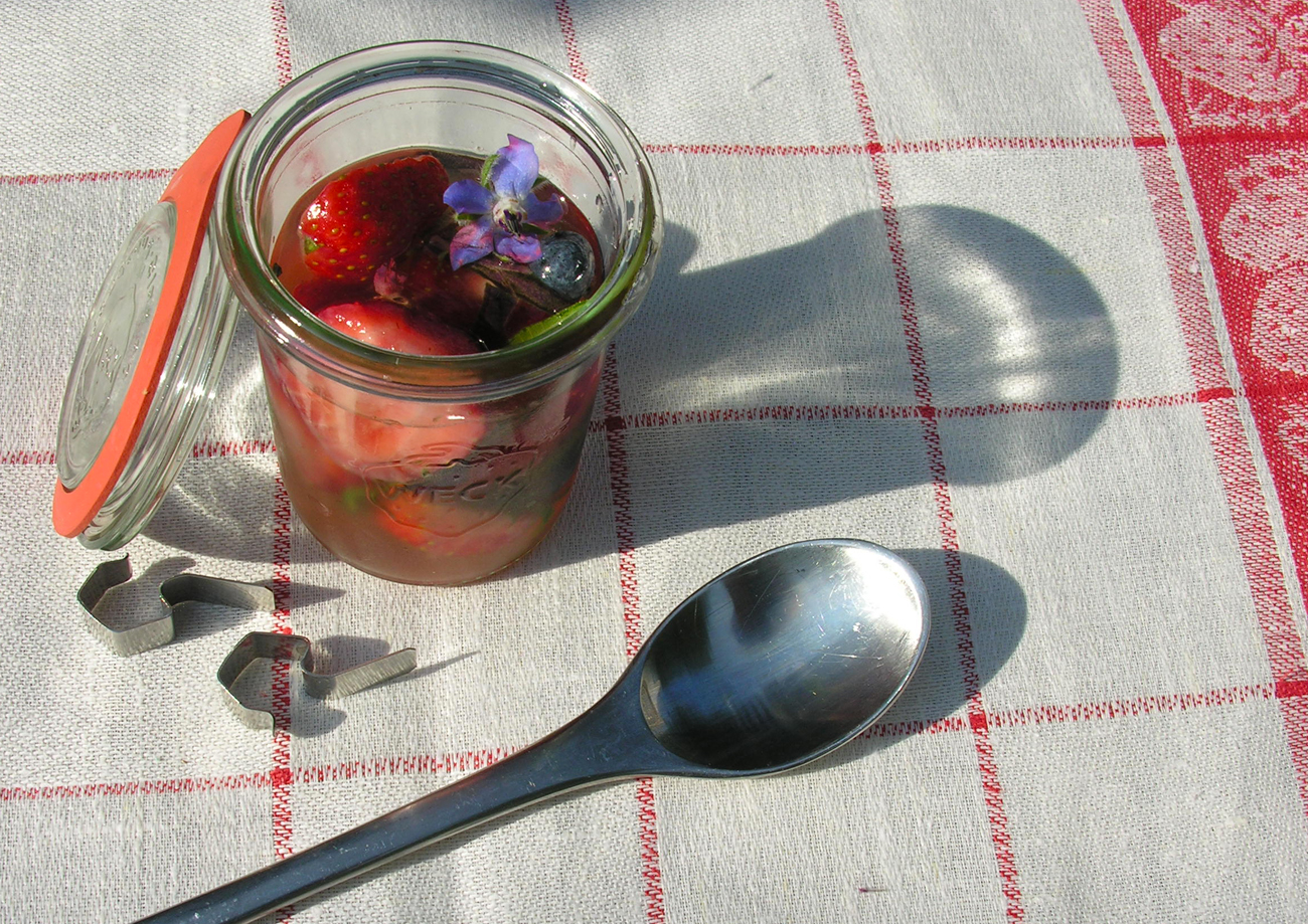 Herbed berries in wine