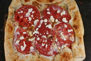Tomato Galette with Goat Cheese, Caramelized Onions, and Bacon