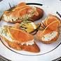 Smoked Salmon on Mustard-Chive and Dill Butter Toasts.