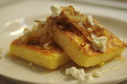 Griddled Polenta Cakes with Caramelized Onions, Goat Cheese, and Honey