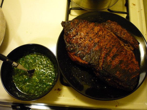 Perfectly grilled flank steak with chimichurri sauce
