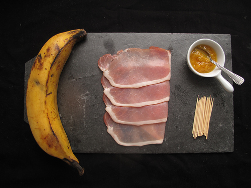 Bacon-rolled Plantains with Yellow chilli Sauce