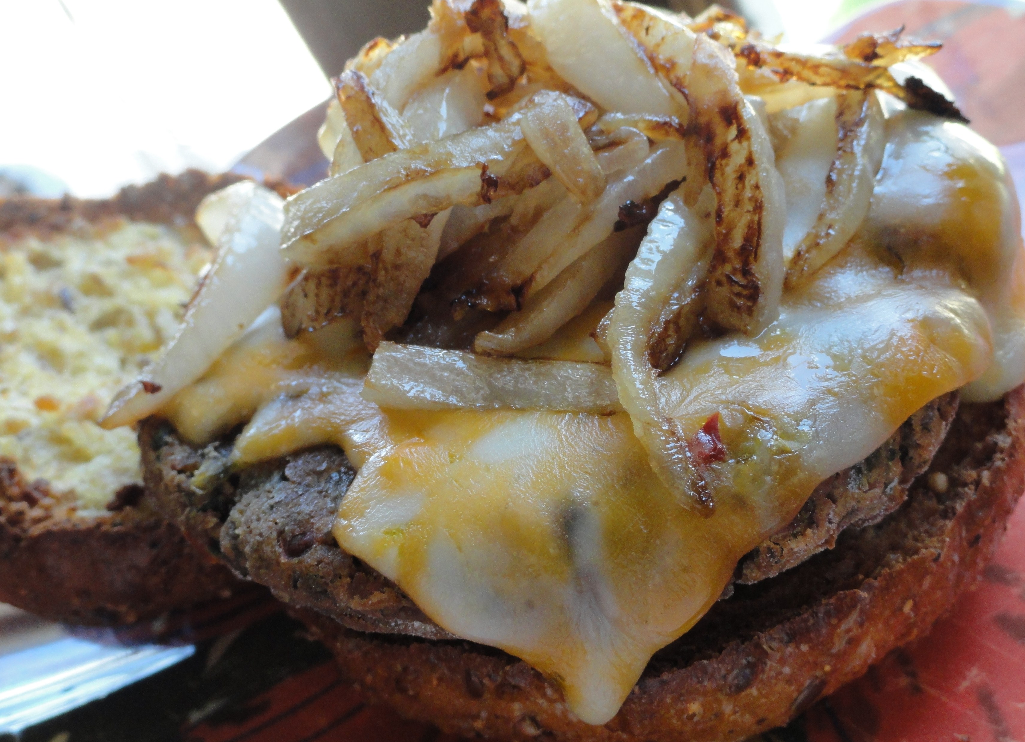 Cheesy Chili Pepper Pinto Sliders with Caramelized Onions