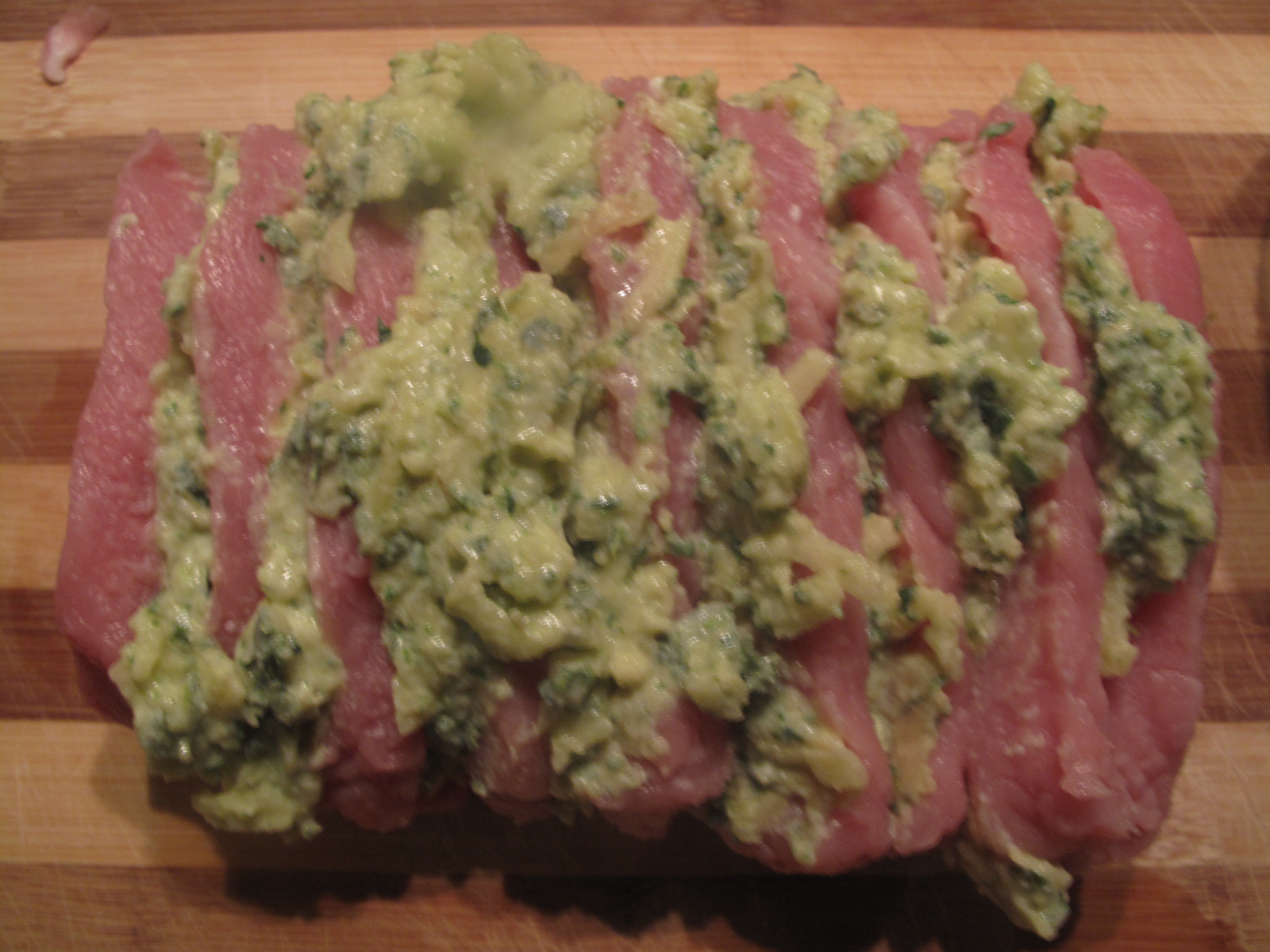 Pork Hassleback with fresh poultry seasoning and cider