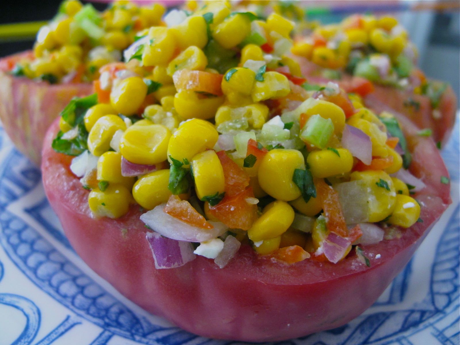 BEEF STEAK TOMATOES STUFFED WITH CORN AND HERB SALAD