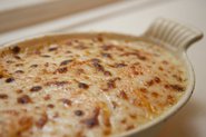Individual Sweet Potato Gratins with Creme Fraiche, Onions, and Bacon