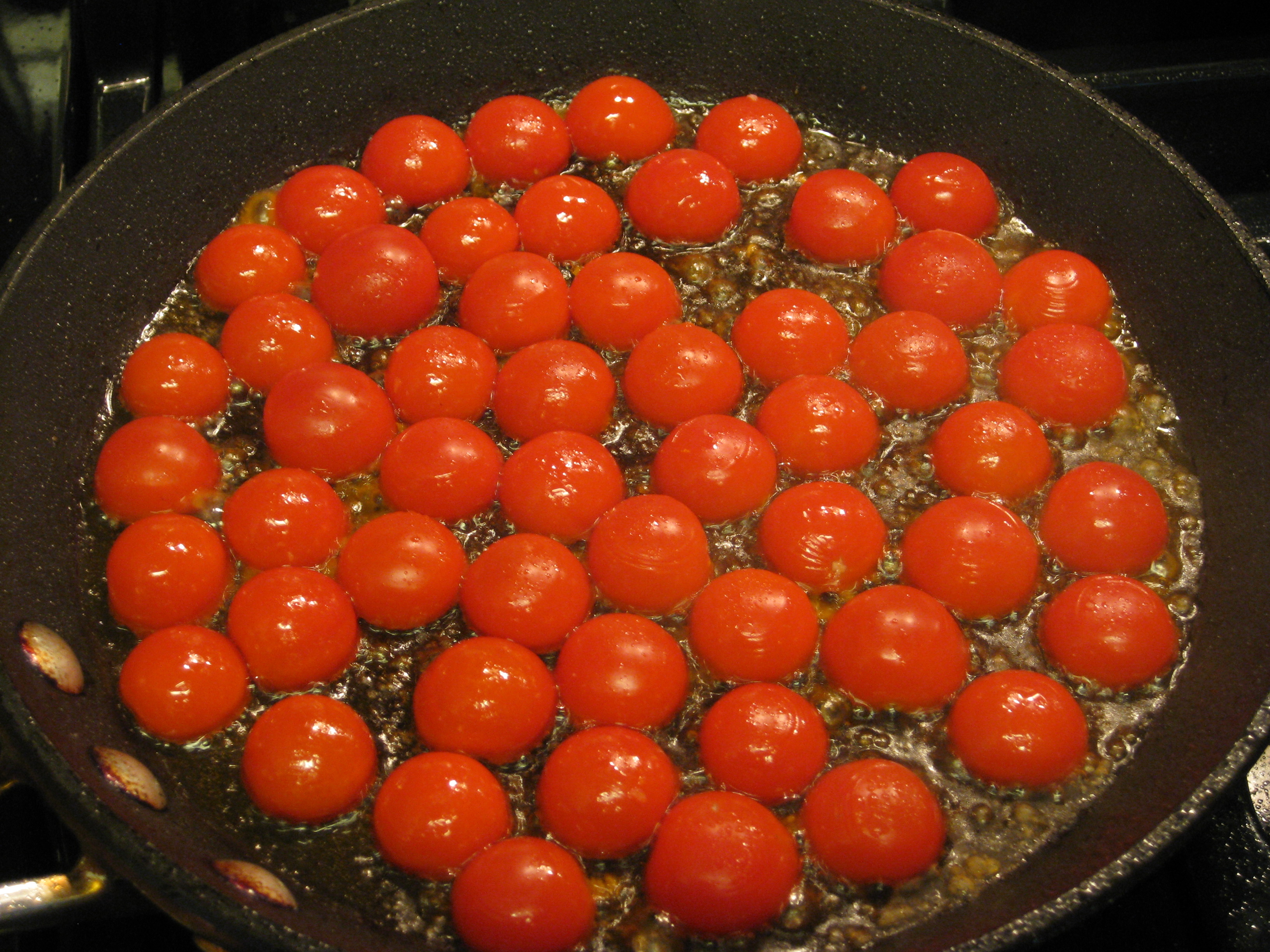 Seared Cherry Tomatoes with Spinach Pesto and Buccatini