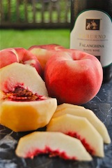 Pesche al vino bianco
