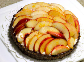Mascarpone Mousse in Chocolate Tart decorated with Peaches marinated in Peach Liqueur   