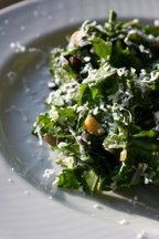 Raw Kale Salad with Pinenuts, Currants, and Ricotta Salata