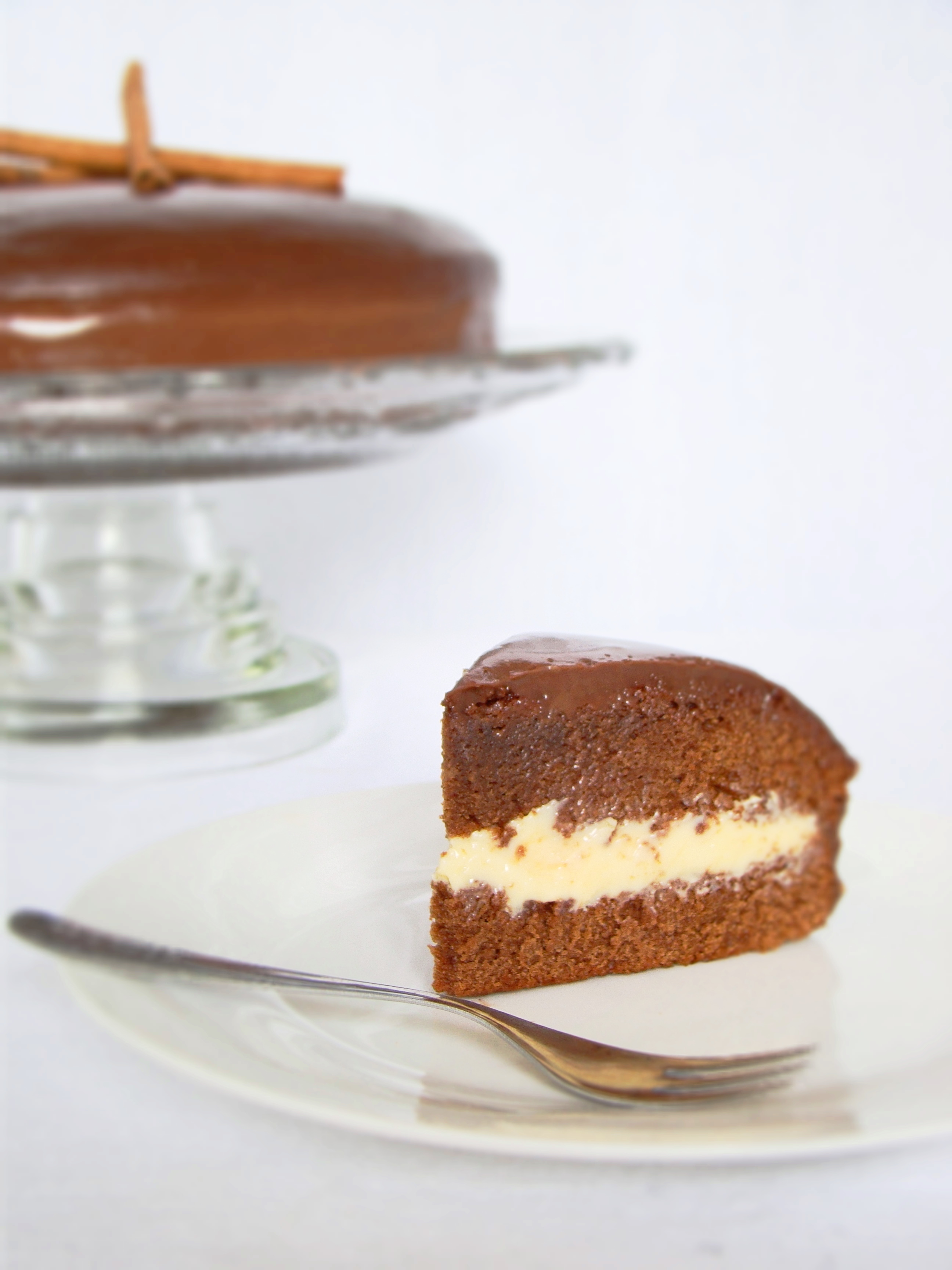 Honey Cake with White Brigadeiro Filling Covered with Chocolate Ganache