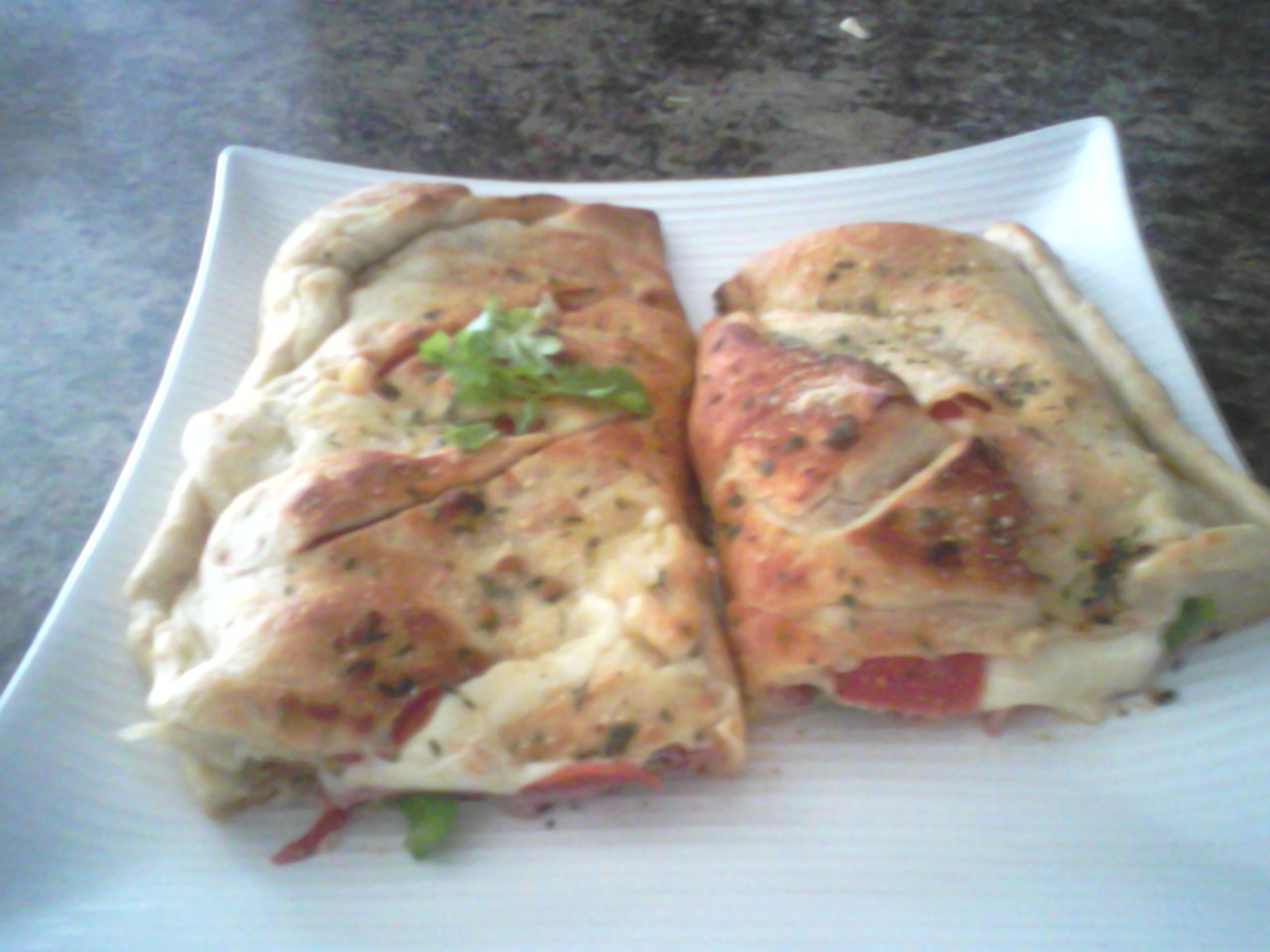 Italian calzone with asaigo and olive oil crust