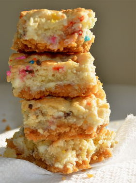 Loaded Cream Cheese Cookie Bars with Animal Cookie Crust