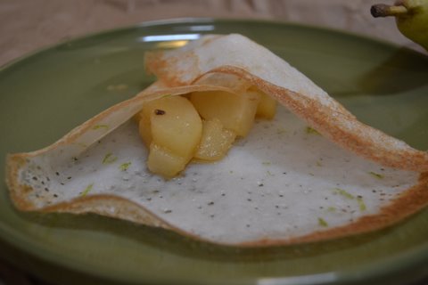 Rice crepes stuffed with spiced poached pears (stuffed aapams)