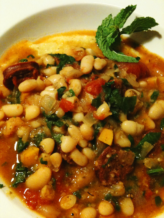 White Bean Lamb Kielbasa Stew over Polenta