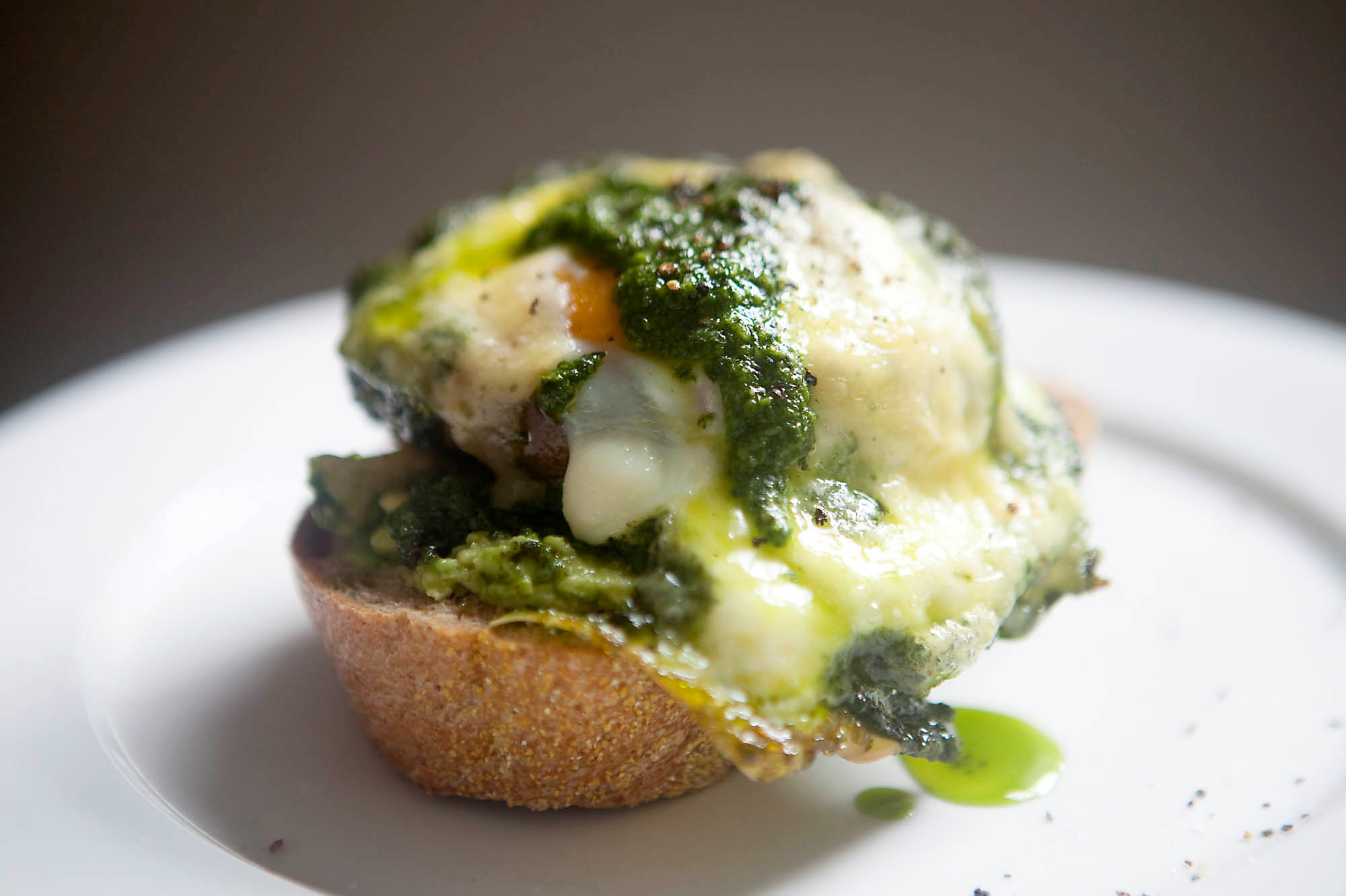 Roasted Portabello Mushroom Baked with Egg, Pesto and Cheddar