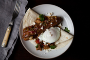 Huevos Rancheros (Country-Style Eggs Topped with Pork and Green Chile)