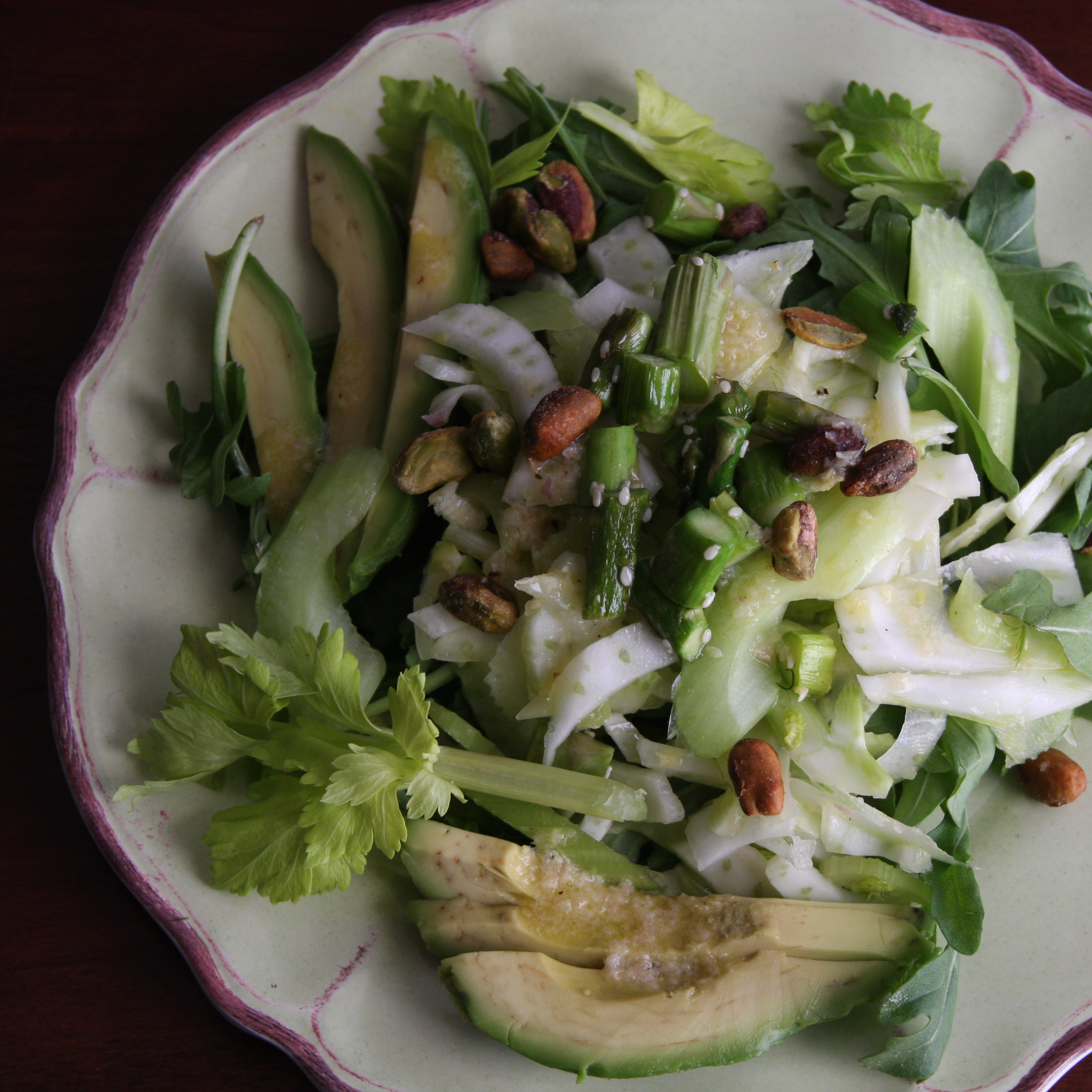 In a Crunch Celery Fennel Slaw with Ginger over a Bed of Arugula