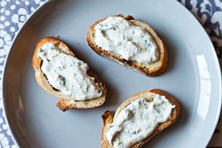 Herbed ricotta and anchovy crostini