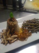 Twice cooked chicken, sides of dirty rice,Made caramelized (made sweet) onions 