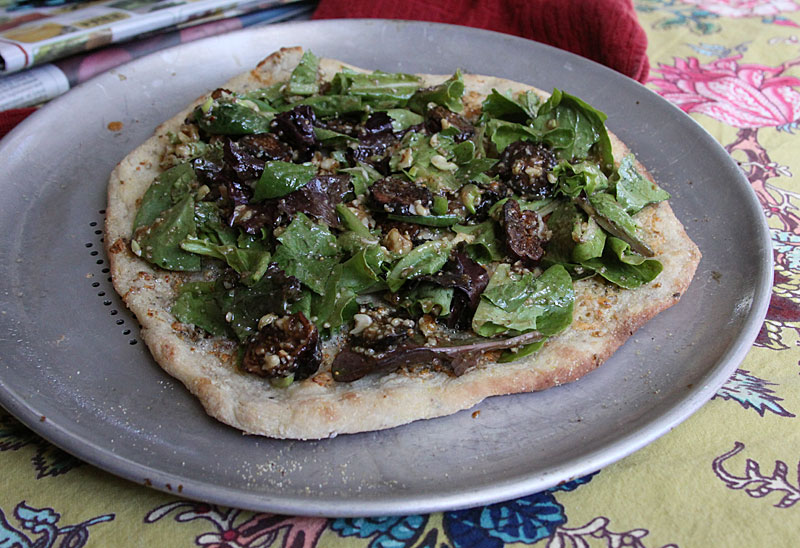 Herbed salad flatbread with fig, pecan vinaigrette